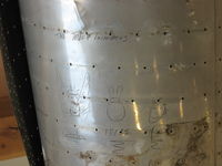 44-85813 @ I74 - Sixty-one year old signatures discovered on the inside of a wing skin. - by Bob Simmermon