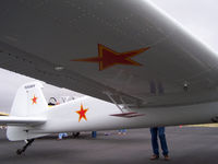 N55MY @ KFTG - Side, below wing view. - by Bluedharma