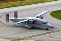 94-0311 @ CID - C-23B Sherpa taxiing past the control tower