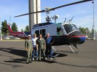 N4073A - Col. Roberts, Ret. (L) & the delivery crew - by Meade Roberts