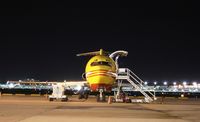 N762AT @ STL - Under the  lights, with the STL terminal in the background.