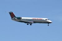 N37208 @ KLAS - America West Express / 1997 Canadair CL-600-2B19 - by Brad Campbell