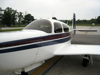 N5236G @ KGYY - Mooney Profile - by Jim Kerr
