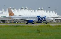 N484UA @ DEN - Taxiing Alpha November Jeppesen Terminal in background