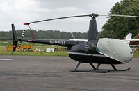 G-PROJ @ EGHH - Robinson R-44 - by Les Rickman