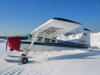 C-GSPK @ CYMM - Cessna 185 on ski's - by Ken Shearer