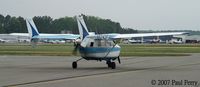N6243F @ PVG - Taxiing out to leave, only using the aft motor - by Paul Perry