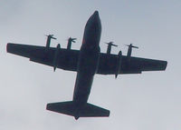 93-7313 - C-130 Hercules Flight over Columbine High School A C-130 Hercules from the 302nd Air Wing, Peterson Air Force Base, Colo.