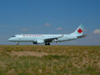 C-FFYM @ DEN - On Taxiway Lima to Runway.