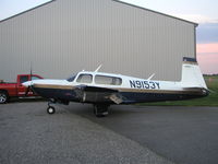 N9153Y @ KLVN - Mooney parked infront of the Wentworth Aircraft hangar at Airlake. - by Mitch Sando