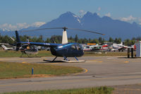 C-FGXI @ CYNJ - Parked on the fuel ramp - by Guy Pambrun