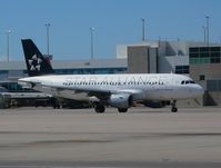 N703UW @ DEN - Taxiing on Charlie Sierra eastbound.