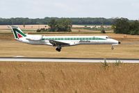 I-EXMG @ VIE - Alitalia Express Embraer 145LR moments before touch down RWY 34 - by Dieter Klammer