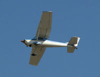 N8239F @ DTN - Departing runway 32 DTN - by Carl Hennigan
