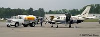 N703CA @ PVG - Prepping to leave, getting her tanks topped off - by Paul Perry