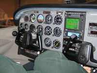 N143RA @ KCFE - Instrument panel.  Paul's poking around underneath - by Alicia Vitalis