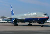 N773UA @ DEN - United Airlines 777 just pushed off B36. - by Francisco Undiks