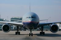 N773UA @ DEN - United Airlines 777 just pushed off B36. - by Francisco Undiks