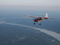 N3659C - John Estridge Heading South over the Ohio River - by Allen M. Schultheiss