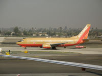 N338SW @ LAX - Southwest 737-3H4 in old colors taxying @ LAX - by Steve Nation