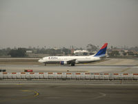 N390DA @ LAX - Delta 737-832 rolling @ LAX - by Steve Nation