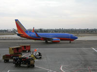 N451WN @ LAX - Southwest 737-7H4 in new colors taxying @ LAX - by Steve Nation