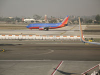 N687SW @ LAX - Southwest 737-3Q8 in new colors rolling @ LAX - by Steve Nation