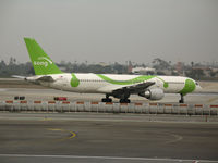 N697DL @ LAX - Song 757-232 turning onto active runway @ LAX - by Steve Nation