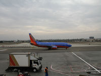 N716SW @ LAX - Southwest 737-7H4 in new colors taxying in to gate @ LAX - by Steve Nation