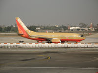 N726SW @ LAX - Southwest 737-7H4 in old colors and winglets taxying @ LAX - by Steve Nation