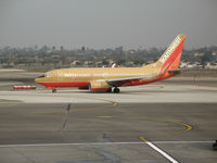 N763SW @ LAX - Southwest 737-7H4 in old colors with winglets taxying @ LAX - by Steve Nation