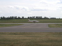 N6920G @ KLVN - Landing Runway 30 at Airlake. - by Mitch Sando