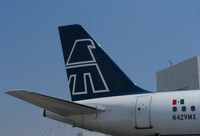 N429MX @ DEN - Mexicana A319 tail - by Francisco Undiks