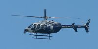 N407FC - Fairfax County Police helicopter circled several times over my yard sale, July 14, 2007. - by David Cowhig