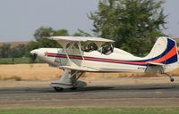N777KB @ MARTIN - Patty waves, Pat pilots on take off - by Rulo