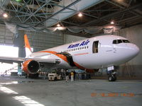 N619UA @ KGYR - Former United in paint shop at Phoenix-Goodyear Mun. - by John J. Boling