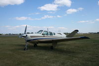 N7264B @ KOSH - Beech J35