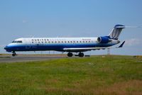 N740SK @ DEN - United Express operated by SkyWest.