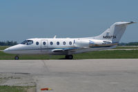 N697TA @ YXU - Parked at Ramp III - by topgun3