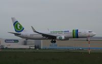 PH-HZF @ AMS - Taken on a gloomy evening at Schipol - by Steve Staunton
