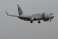 PH-HZX @ AMS - Taken on a gloomy evening at Schipol - by Steve Staunton