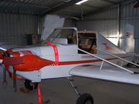 VH-LJO @ BARWON HEA - Photo of Gandson in Aircraft in the Hanger - by Curtis Oliver