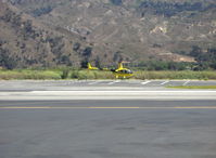 N108LG @ SZP - 2006 Robinson R44 RAVEN II, Lycoming IO-540 derated to 245 Hp for 5 min., 205 Hp cont., near touchdown - by Doug Robertson