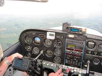 N8153L @ OSH - Don at the controls - 4500' over NW Ohio - by Bob Simmermon