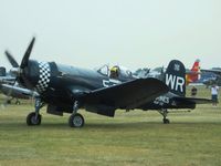N179PT @ OSH - Wings almost down at Airventure '07 - by Bob Simmermon