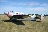 N127ML @ KOSH - Beech D18S - by Mark Pasqualino