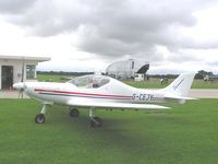 G-CEJY @ EGBK - WT9 Dynamic under threatening sky at Sywell - by Simon Palmer