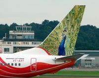 VT-AXR @ EGBB - Continuing this airline's policy of unique tail schemes - by Terry Fletcher