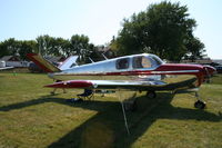 N5186C @ KOSH - Beech B35