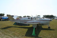 N3815N @ KOSH - Beech 35